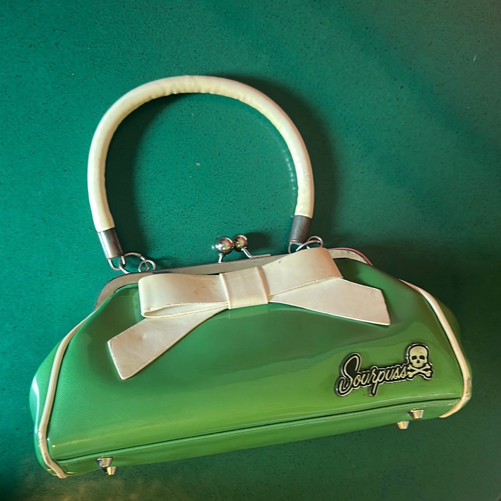 Sourpuss Green and White with Streamlined Design